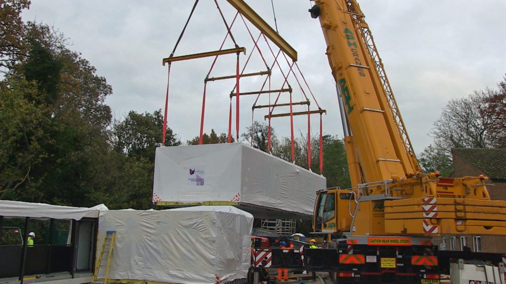 Webster Court apartment being craned into position in Norwich