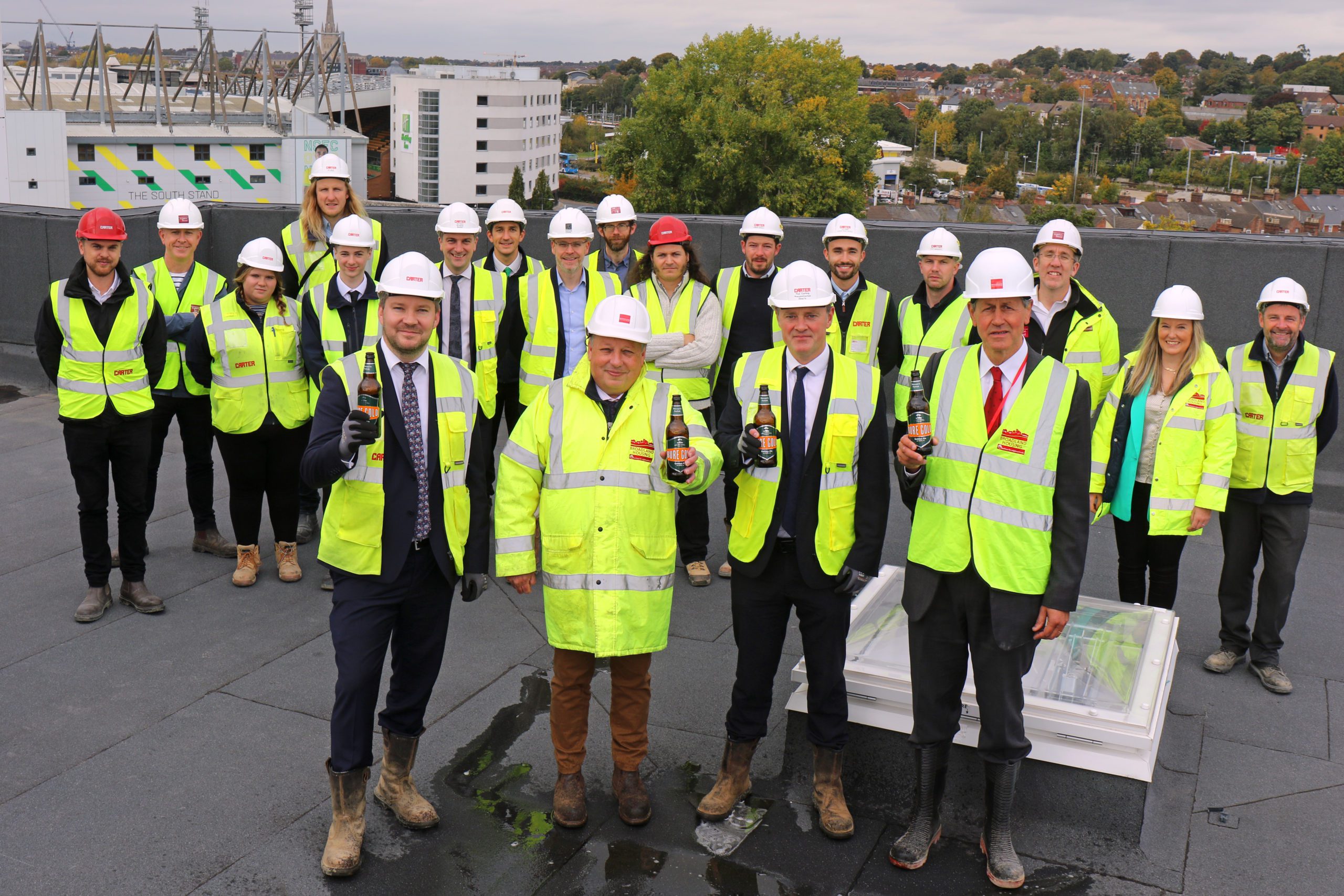 'Topping out' ceremony - Broadland Housing, R G Carter and Ingleton Wood staff at Canary Quay phase 4, October 2022