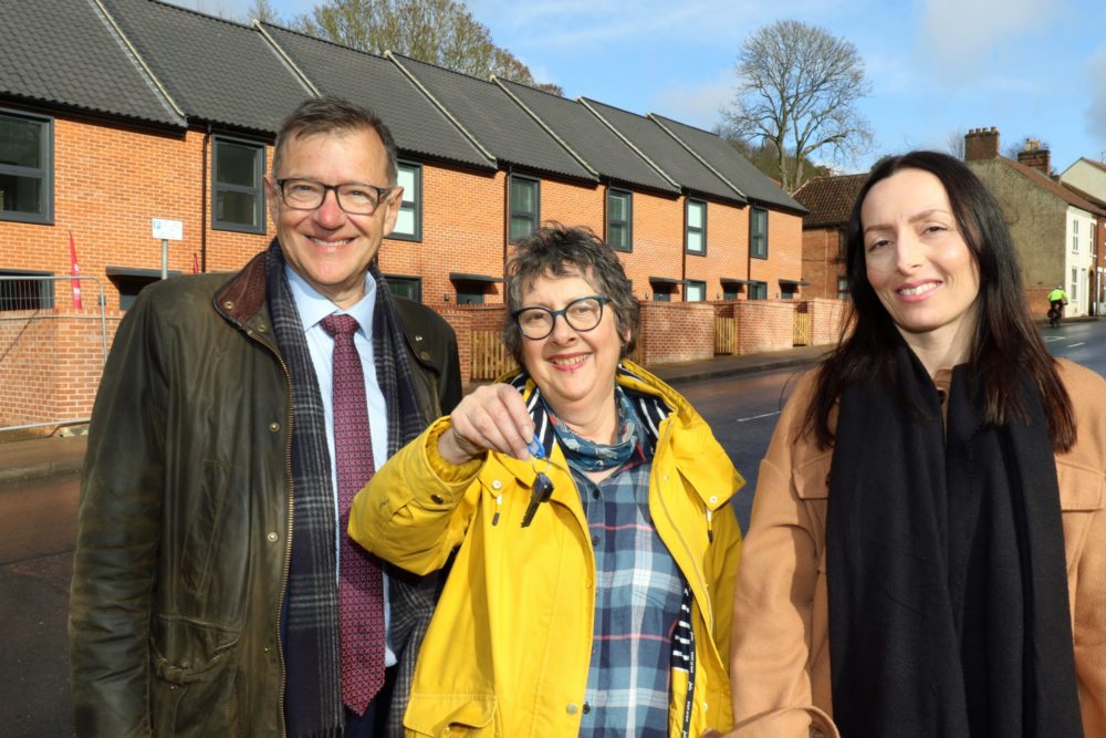 Michael Newey, Gail Harris and Siobhan Trice at the handover of 7 new homes for former rough sleepers Ketts Hill at Norwich, February 2023